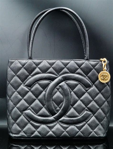 chanel medallion black quilted leather tote